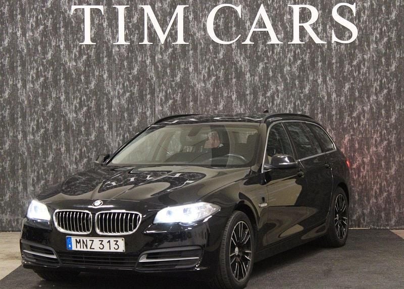 Svart Begagnad 2014 BMW 520 Kombi | 139 999 kr (Marknadspris) - Bild 1/4