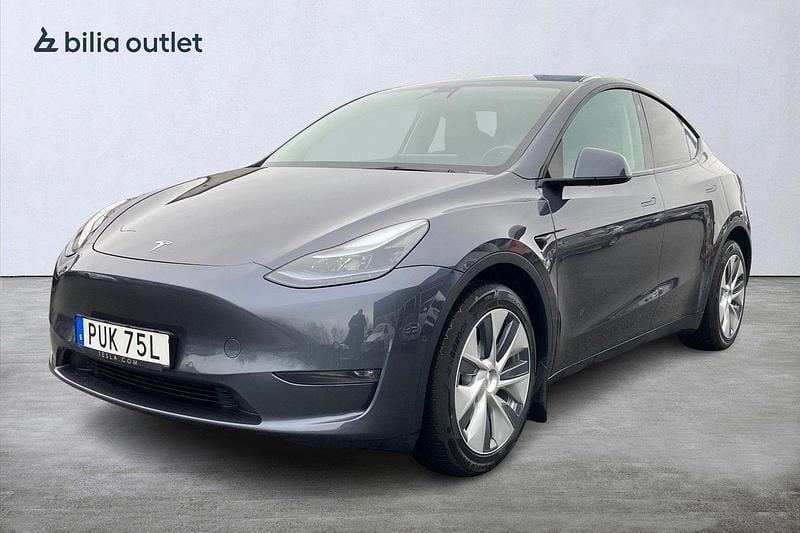 Grå Begagnad 2022 Tesla Model Y Long Range AWD SUV | 419 900 kr (Marknadspris) - Bild 1/4