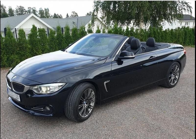 Svart Begagnad 2015 BMW 428 Luxury Line Cab | 203 000 kr (Marknadspris) - Bild 1/4