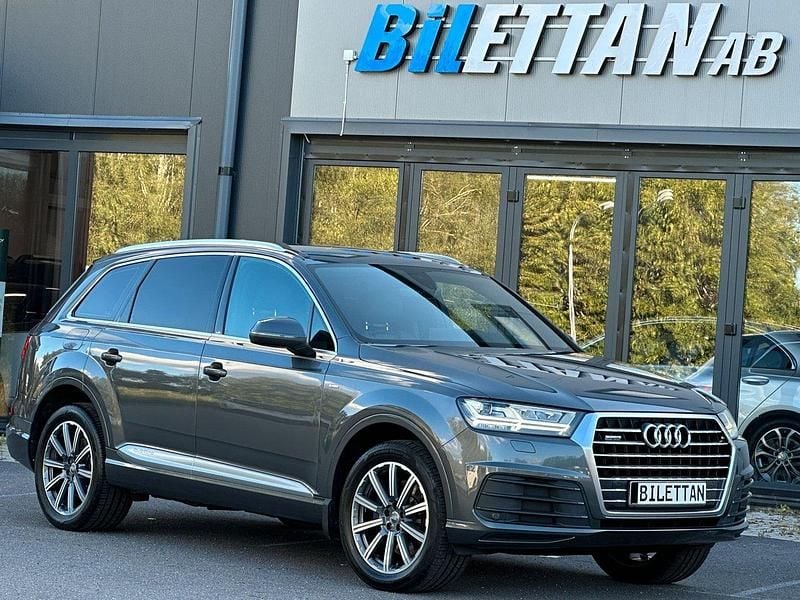Grå Begagnad 2016 Audi Q7 S-Line SUV | 359 900 kr (Marknadspris) - Bild 1/4