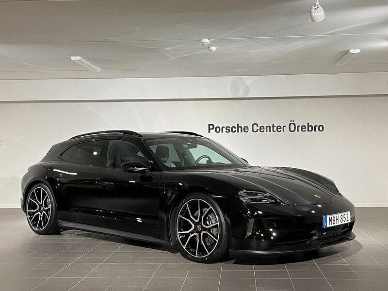 Svart Ny 2024 Porsche Taycan Sport Turismo Sedan | 1 406 700 kr - Bild 1/4