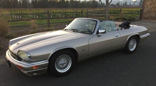 Röd metallic Begagnad 1993 Jaguar XJS Cab | 225 000 kr - Bild 1/2