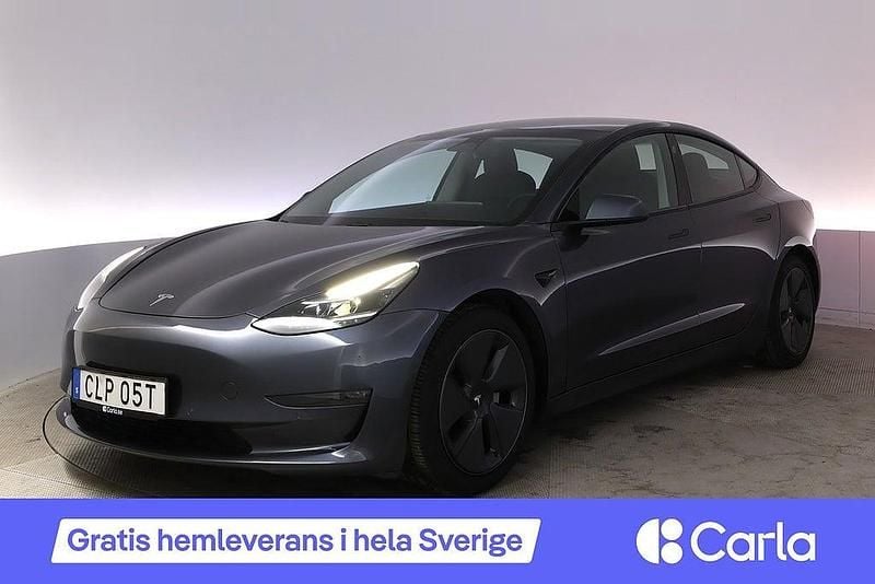 Grå Begagnad 2021 Tesla Model 3 Long Range AWD Sedan | 333 900 kr (Marknadspris) - Bild 1/4