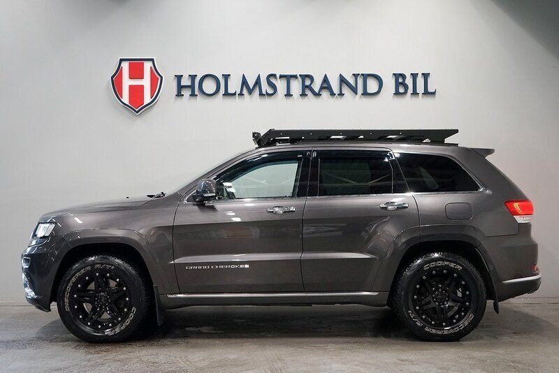 Grå Begagnad 2014 Jeep Grand Cherokee Summit SUV | 249 900 kr (Lite dyr) - Bild 1/4