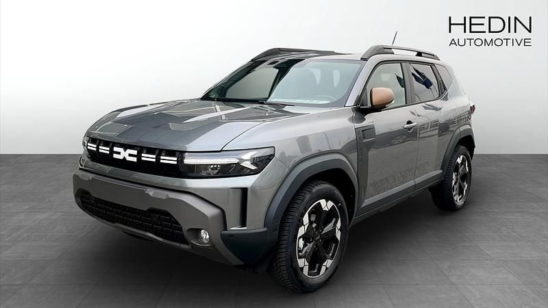 Grå (brown) Begagnad 2024 Dacia Duster Extreme SUV | 329 200 kr - Bild 1/4
