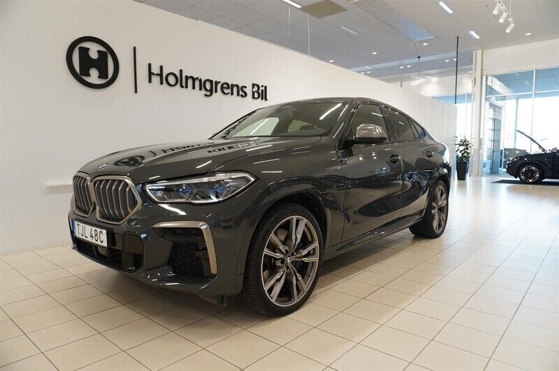 Okänd Begagnad 2022 BMW X6 M50 Comfort Edition SUV | 999 900 kr - Bild 1/4