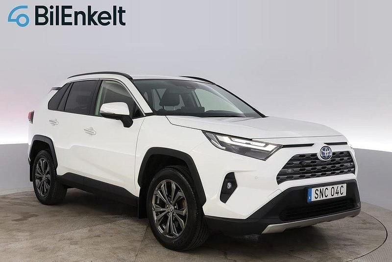 Vit Begagnad 2023 Toyota RAV4 Hybrid Executive SUV | 428 900 kr (Marknadspris) - Bild 1/4