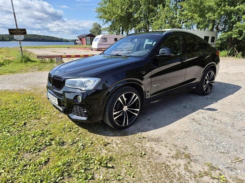 Svart Begagnad 2015 BMW X4 M Sport SUV | 197 000 kr (Marknadspris) - Bild 1/4