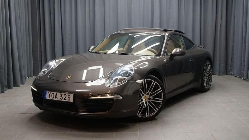 Mörkbrun Begagnad 2013 Porsche 911 Carrera Sportkupé | 579 000 kr - Bild 1/4