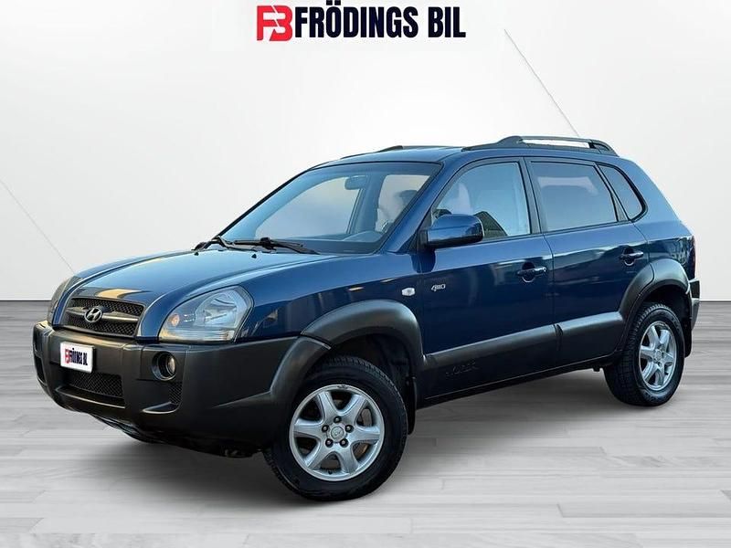 Mörkblå Begagnad 2004 Hyundai Tucson SUV | 44 900 kr (Bra pris) - Bild 1/4