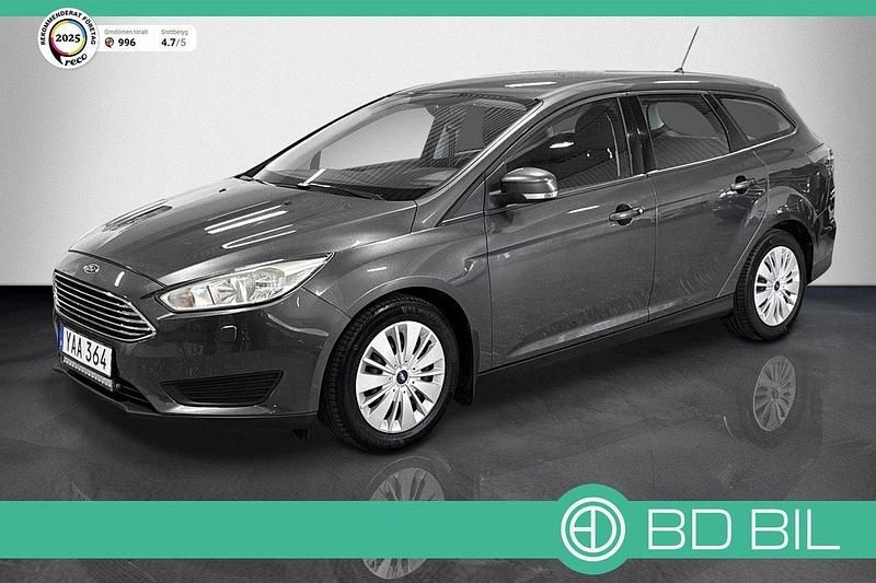 Grå (gråmetallic) Begagnad 2015 Ford Focus Kombi | 67 600 kr (Marknadspris) - Bild 1/3