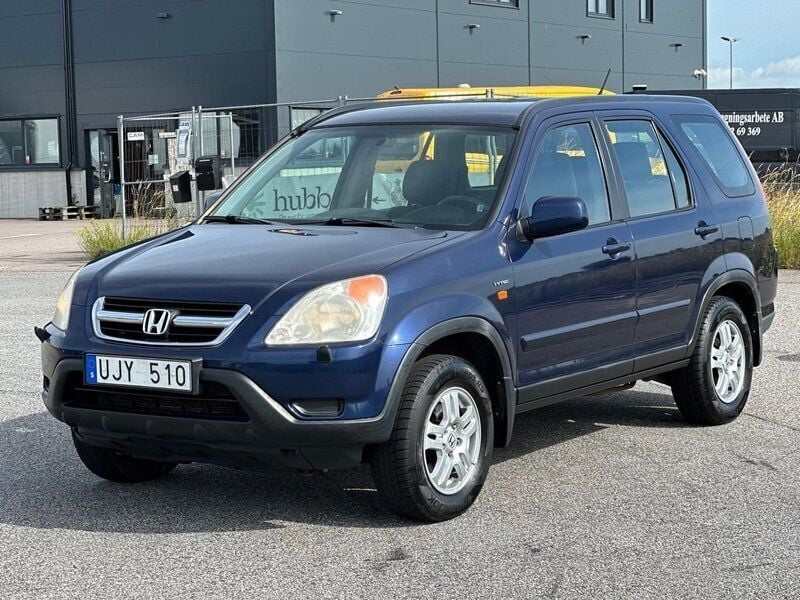 Mörkblå (blå) Begagnad 2003 Honda CR-V SUV | 17 500 kr (Superpris) - Bild 1/4