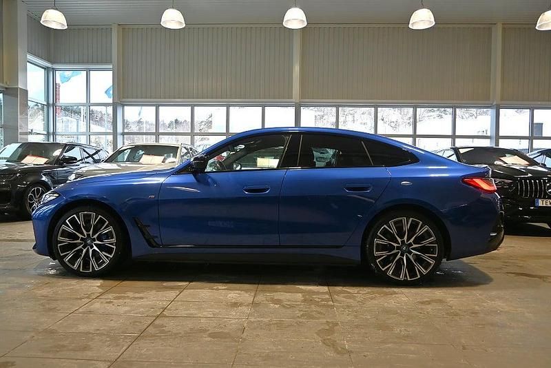 Begagnad BMW i4 M Sport 442 kW (601 HK) 2022 Blå Sedan