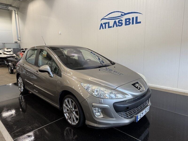 Grå Begagnad 2010 Peugeot 308 Halvkombi | 39 900 kr (Marknadspris) - Bild 1/4
