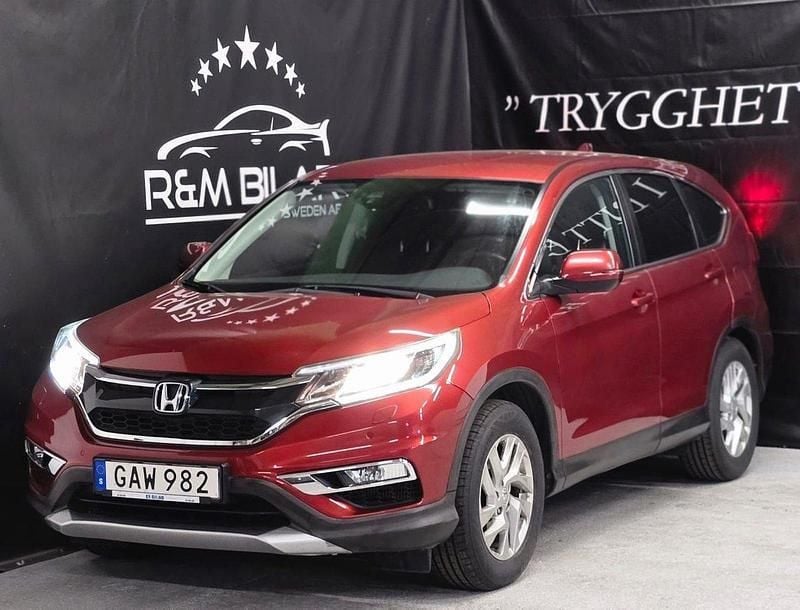 Röd Begagnad 2015 Honda CR-V S SUV | 134 800 kr (Marknadspris) - Bild 1/4