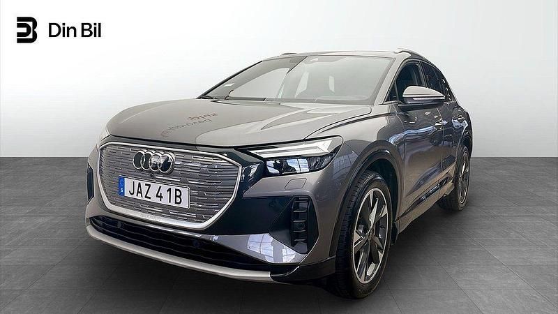 Tyfongrå metallic Begagnad 2024 Audi Q4 e-tron Advanced Plus SUV | 509 000 kr (Marknadspris) - Bild 1/4