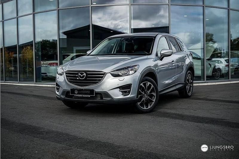 Grå Begagnad 2015 Mazda CX-5 Optimum SUV | 139 900 kr (Marknadspris) - Bild 1/4