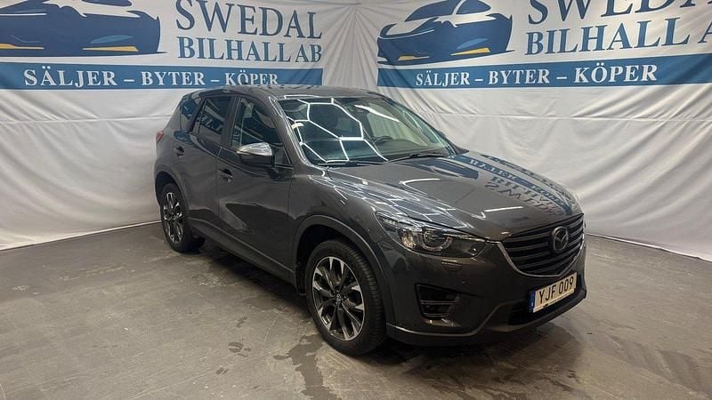 Grå Begagnad 2016 Mazda CX-5 SUV | 154 800 kr (Marknadspris) - Bild 1/4