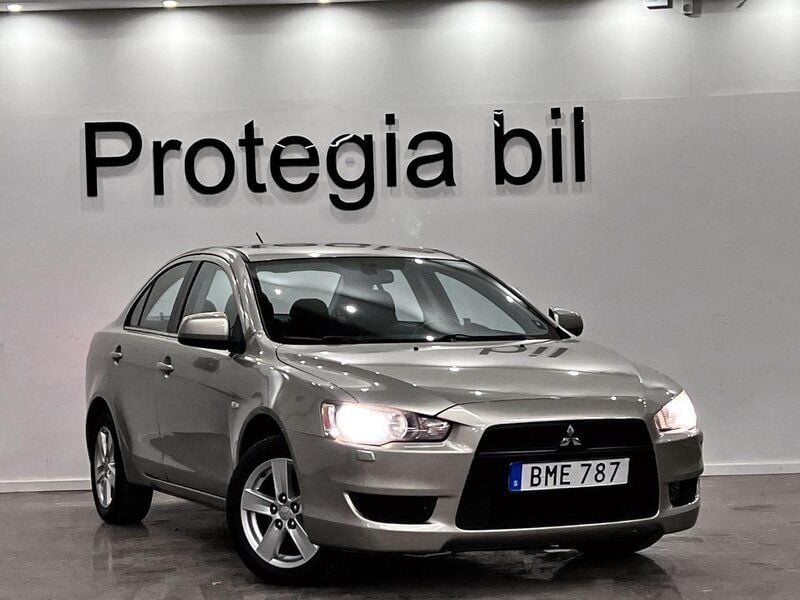 Ljusbrun Begagnad 2007 Mitsubishi Lancer Sedan | 79 900 kr - Bild 1/4