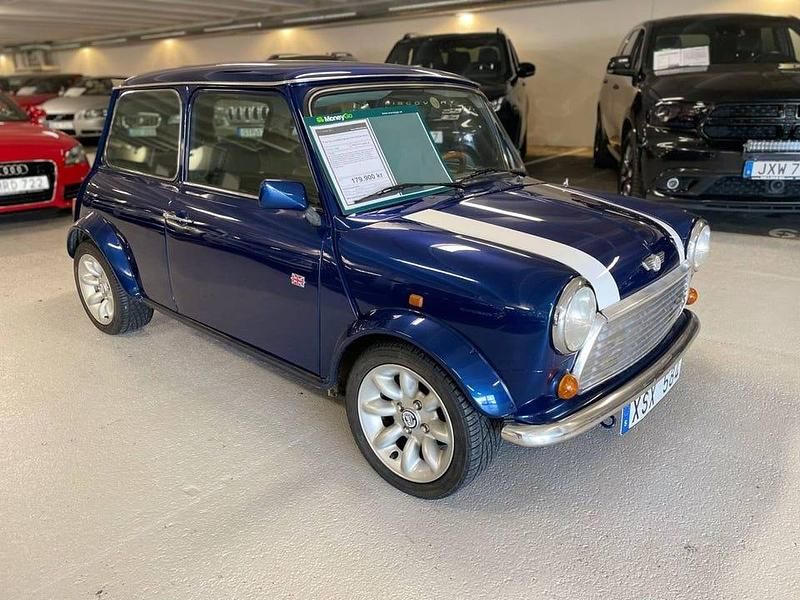 Begagnad Mini Cooper 63 HK (46 kW) 1996 Blåmetallic Halvkombi