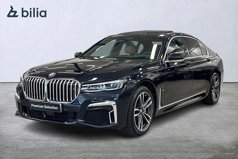 Svart (carbonsvart metallic) Begagnad 2021 BMW 740L Executive Sedan | 779 900 kr - Bild 1/4