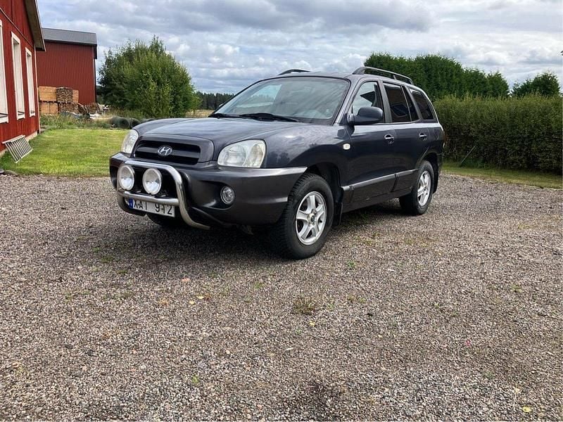 Blå Begagnad 2006 Hyundai Santa Fe SUV | 19 500 kr - Bild 1/3