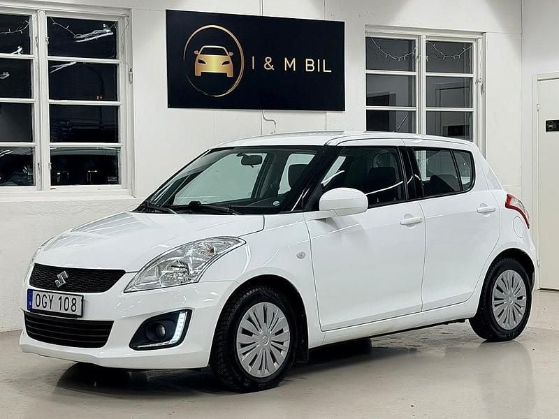 Vit Begagnad 2016 Suzuki Swift Halvkombi | 79 900 kr (Bra pris) - Bild 1/4