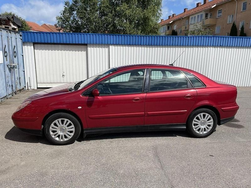 Röd Begagnad 2004 Citroën C5 Halvkombi | 24 500 kr (Marknadspris) - Bild 1/4