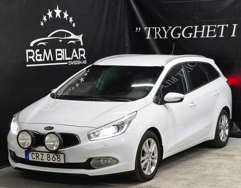 Vit Begagnad 2014 Kia Ceed Kombi | 54 800 kr (Marknadspris) - Bild 1/4