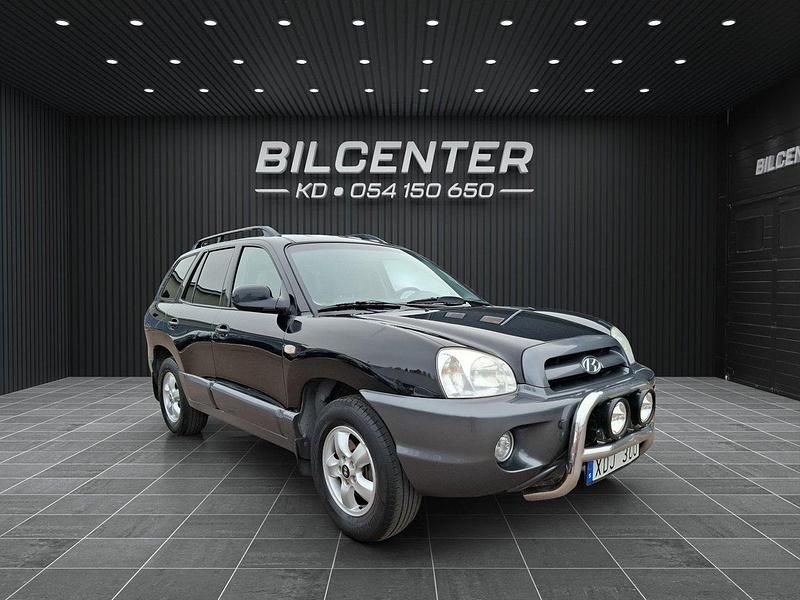 Flerfärgad Begagnad 2005 Hyundai Santa Fe SUV | 29 900 kr (Marknadspris) - Bild 1/4