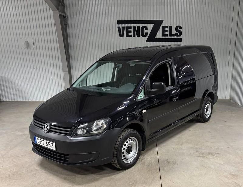 Svart metallic (pearl) Begagnad 2015 VW Caddy Maxi Minibuss | 99 000 kr (Marknadspris) - Bild 1/4