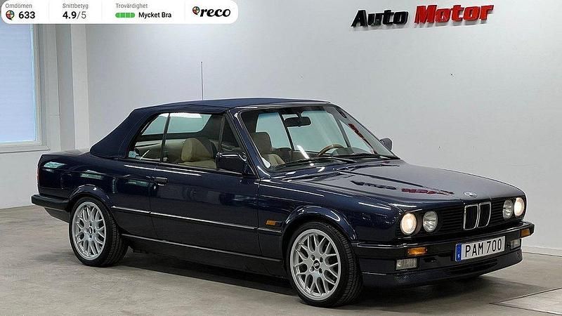 Mörkblå Begagnad 1988 BMW 325 Cabriolet Cab | 269 900 kr - Bild 1/4