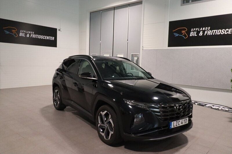 Svart (svart metallic) Begagnad 2021 Hyundai Tucson Advanced SUV | 259 900 kr (Marknadspris) - Bild 1/4