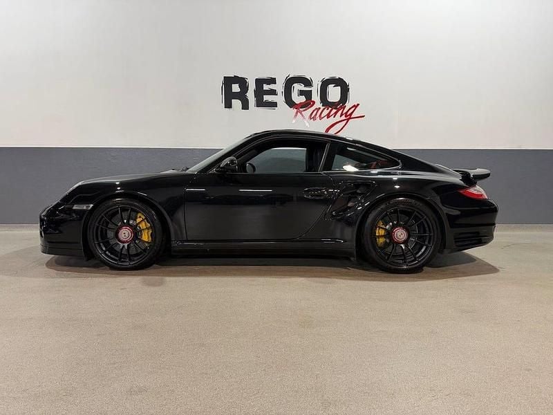 Svart Begagnad 2012 Porsche 911 Turbo S Sportkupé | 1 129 000 kr - Bild 1/4
