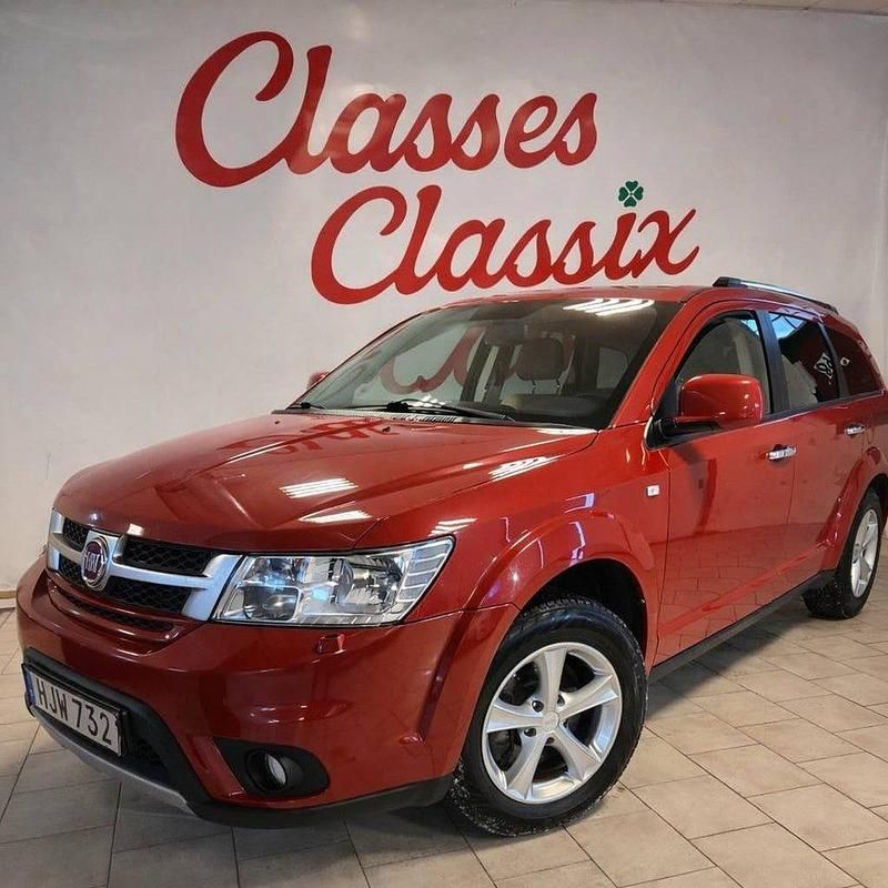 Rödmetalic Begagnad 2014 Fiat Freemont SUV | 89 900 kr (Bra pris) - Bild 1/4