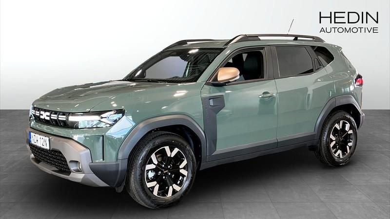 Grå (green) Ny 2025 Dacia Duster Extreme SUV | 333 300 kr (Marknadspris) - Bild 1/4
