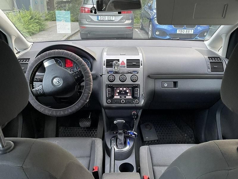 Blå Begagnad 2010 VW Touran Minibuss | 68 000 kr (Bra pris) - Bild 1/4
