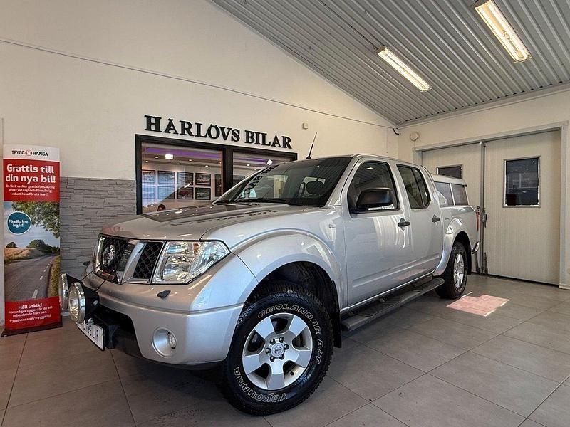 Silver Begagnad 2007 Nissan Navara Pickup | 89 000 kr (Marknadspris) - Bild 1/4