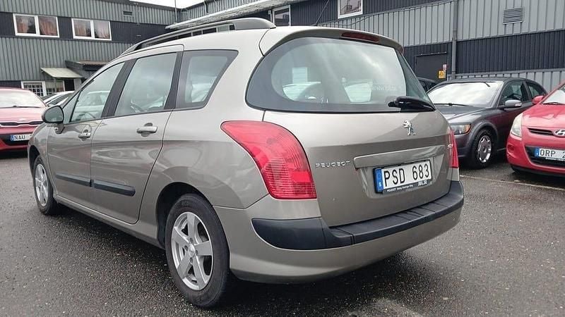 Begagnad Peugeot 308 SW 120 HK (88 kW) 2013 Grå Kombi