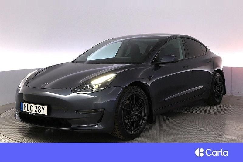 Grå Begagnad 2022 Tesla Model 3 Long Range Sedan | 361 900 kr (Marknadspris) - Bild 1/3