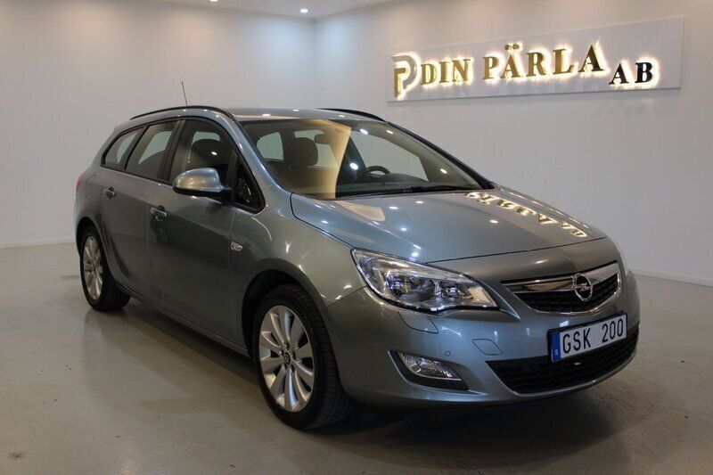 Grå Begagnad 2012 Opel Astra Enjoy Kombi | 54 900 kr (Marknadspris) - Bild 1/4