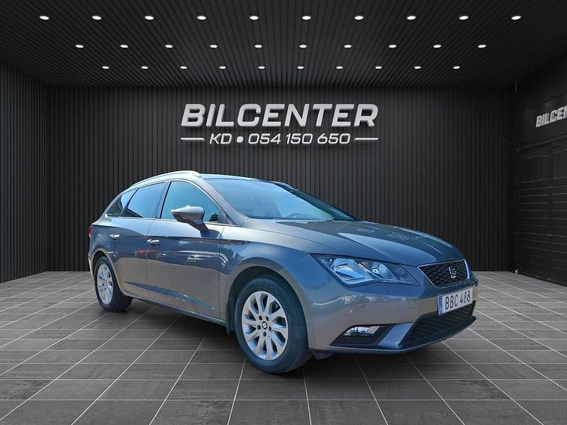 Ljusgrå Begagnad 2014 Seat Leon ST Style Kombi | 99 900 kr (Marknadspris) - Bild 1/4