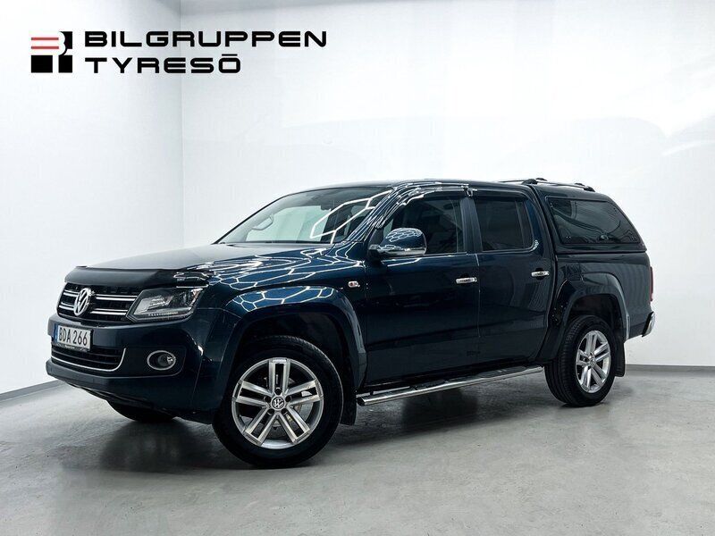 Mörkblå (blå) Begagnad 2016 VW Amarok Pickup | 229 900 kr (Marknadspris) - Bild 1/4