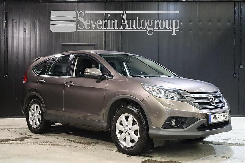 Brun Begagnad 2014 Honda CR-V SUV | 169 000 kr (Marknadspris) - Bild 1/4