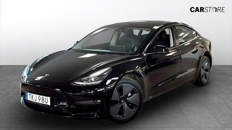 Svart Begagnad 2022 Tesla Model 3 Long Range AWD Sedan | 299 900 kr (Marknadspris) - Bild 1/4