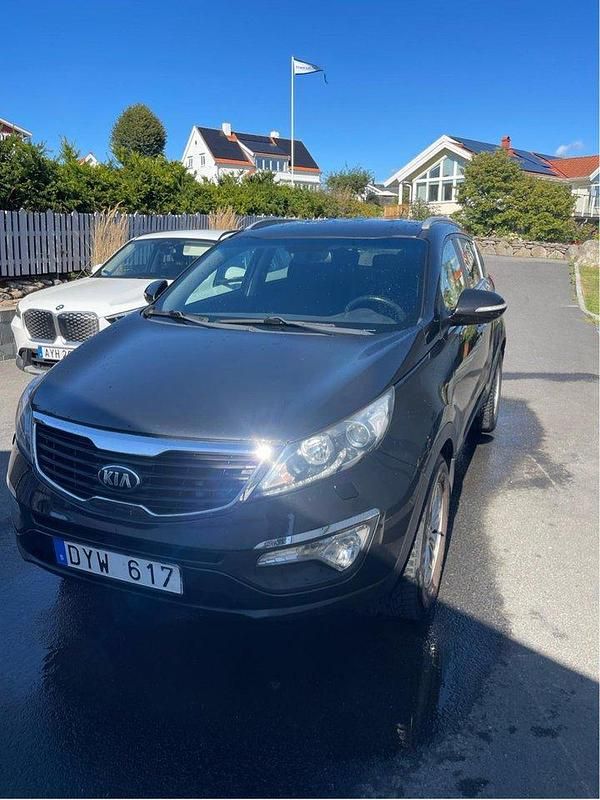 Svart Begagnad 2013 Kia Sportage EX SUV | 100 000 kr (Bra pris) - Bild 1/4