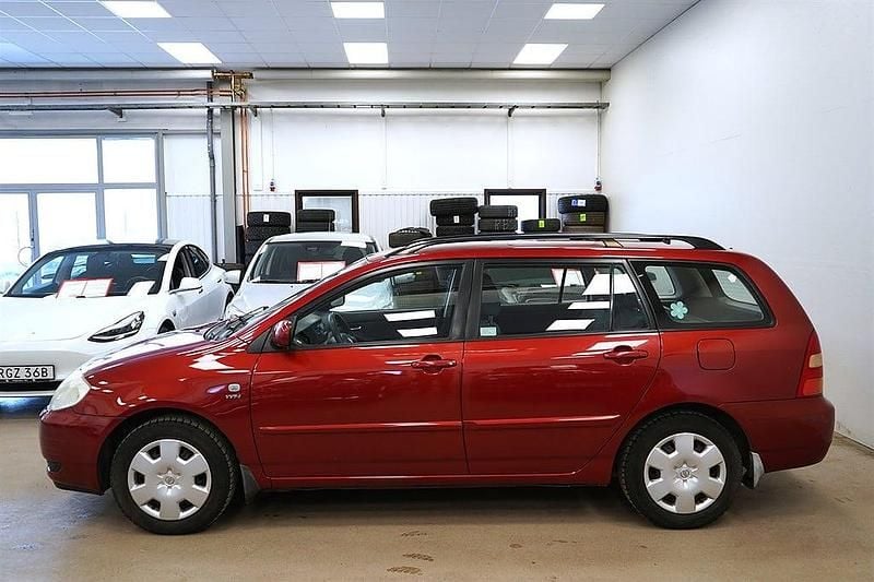 Begagnad Toyota Corolla 110 HK (80 kW) 2003 Rödmetallic Kombi