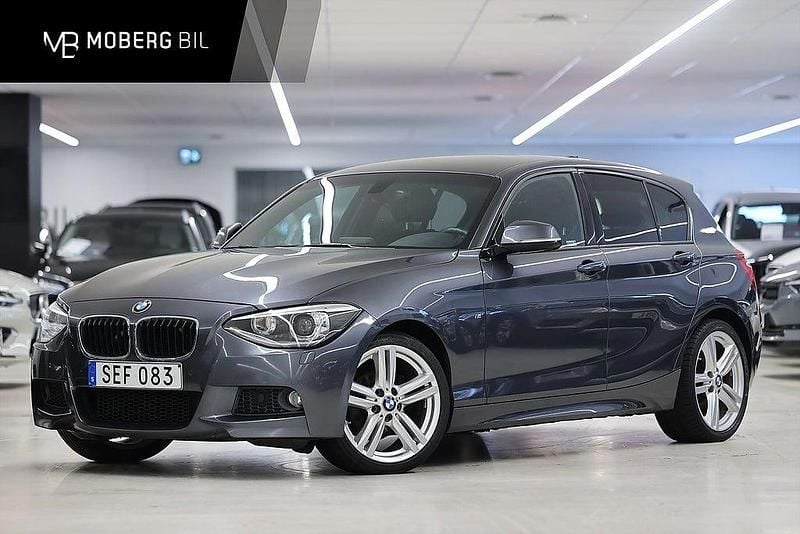 Grå Begagnad 2014 BMW 116 Shadowline Halvkombi | 129 900 kr (Marknadspris) - Bild 1/2