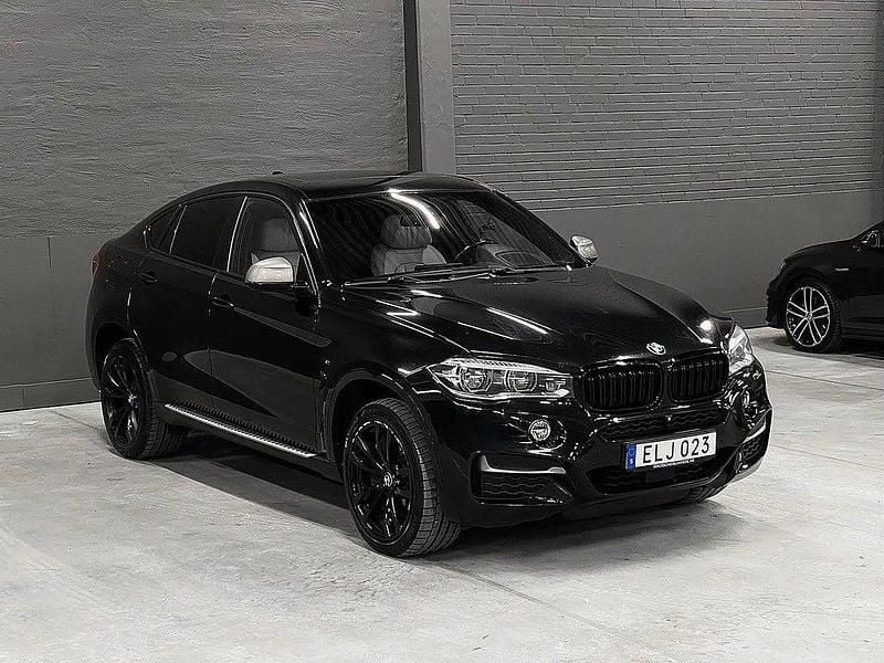 Svart Begagnad 2014 BMW X6 M50 M Sport SUV | 349 900 kr (Marknadspris) - Bild 1/4