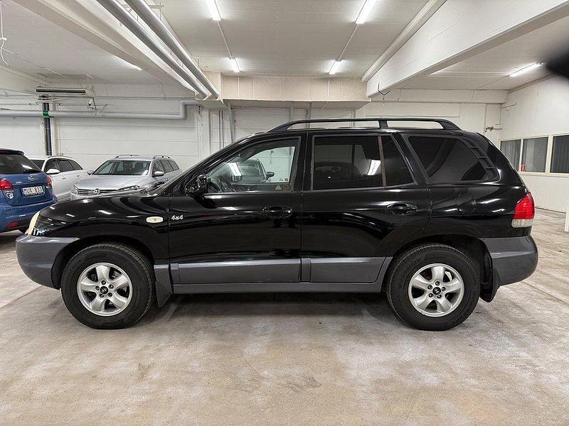 Flerfärgad Begagnad 2005 Hyundai Santa Fe SUV | 34 900 kr (Dyr) - Bild 1/4